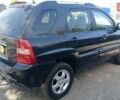 Черный Киа Sportage, объемом двигателя 2 л и пробегом 270 тыс. км за 7700 $, фото 3 на Automoto.ua