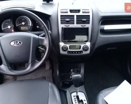 Черный Киа Sportage, объемом двигателя 2 л и пробегом 275 тыс. км за 7600 $, фото 1 на Automoto.ua