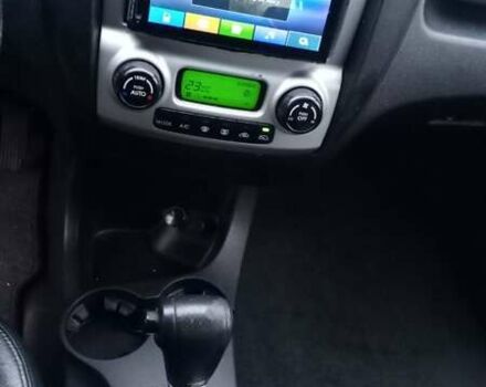 Черный Киа Sportage, объемом двигателя 2 л и пробегом 275 тыс. км за 7600 $, фото 11 на Automoto.ua