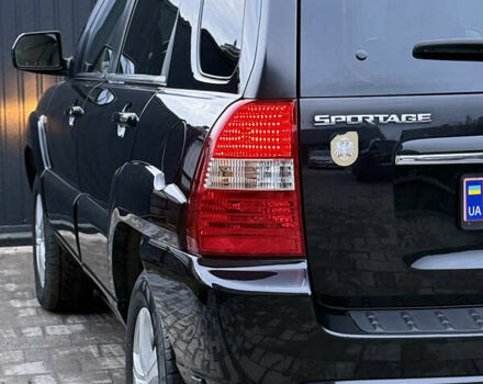 Чорний Кіа Sportage, об'ємом двигуна 2 л та пробігом 215 тис. км за 8600 $, фото 29 на Automoto.ua