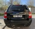 Черный Киа Sportage, объемом двигателя 2 л и пробегом 58 тыс. км за 9999 $, фото 1 на Automoto.ua