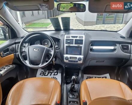 Черный Киа Sportage, объемом двигателя 2 л и пробегом 207 тыс. км за 7950 $, фото 47 на Automoto.ua