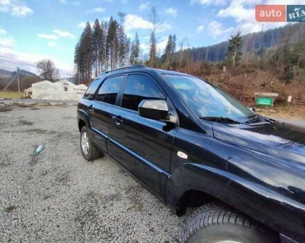 Кіа Sportage 2008 у Межгорье на Automoto.ua Чорний Кіа Sportage, об'ємом двигуна 2 л та пробігом 231 тис. км за 8300 $, фото 12 на Automoto.ua