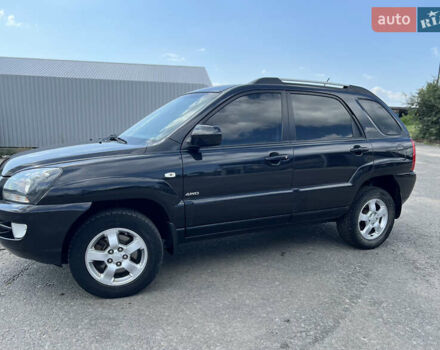 Черный Киа Sportage, объемом двигателя 2 л и пробегом 150 тыс. км за 10000 $, фото 11 на Automoto.ua