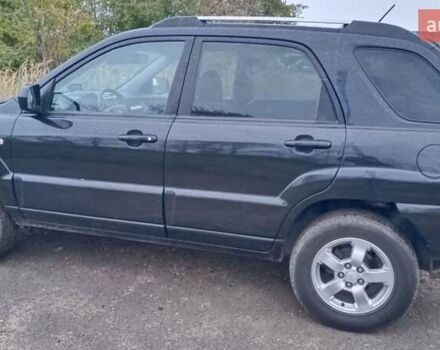 Черный Киа Sportage, объемом двигателя 2 л и пробегом 275 тыс. км за 7600 $, фото 5 на Automoto.ua