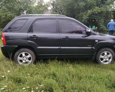 Чорний Кіа Sportage, об'ємом двигуна 2 л та пробігом 248 тис. км за 8600 $, фото 4 на Automoto.ua
