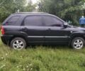 Чорний Кіа Sportage, об'ємом двигуна 2 л та пробігом 248 тис. км за 8600 $, фото 4 на Automoto.ua