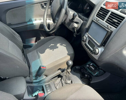 Черный Киа Sportage, объемом двигателя 2 л и пробегом 150 тыс. км за 10000 $, фото 6 на Automoto.ua