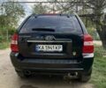 Черный Киа Sportage, объемом двигателя 2.7 л и пробегом 254 тыс. км за 7700 $, фото 2 на Automoto.ua