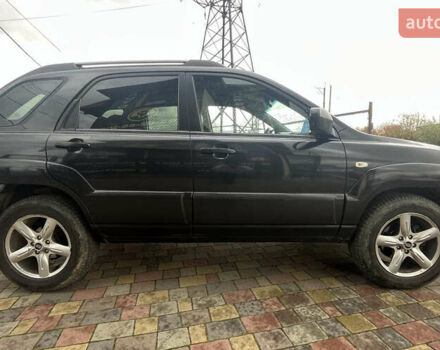 Черный Киа Sportage, объемом двигателя 1.98 л и пробегом 293 тыс. км за 6600 $, фото 7 на Automoto.ua