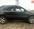 Черный Киа Sportage, объемом двигателя 1.98 л и пробегом 293 тыс. км за 6600 $, фото 7 на Automoto.ua