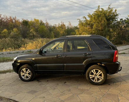 Черный Киа Sportage, объемом двигателя 2 л и пробегом 257 тыс. км за 10300 $, фото 4 на Automoto.ua