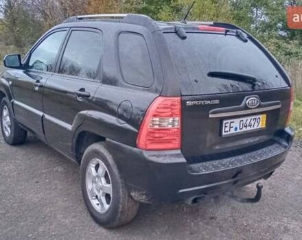 Черный Киа Sportage, объемом двигателя 2 л и пробегом 275 тыс. км за 7600 $, фото 7 на Automoto.ua