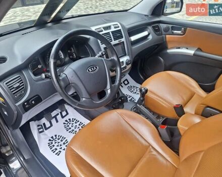 Черный Киа Sportage, объемом двигателя 2 л и пробегом 207 тыс. км за 7950 $, фото 34 на Automoto.ua