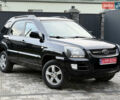 Чорний Кіа Sportage, об'ємом двигуна 2 л та пробігом 215 тис. км за 8600 $, фото 3 на Automoto.ua