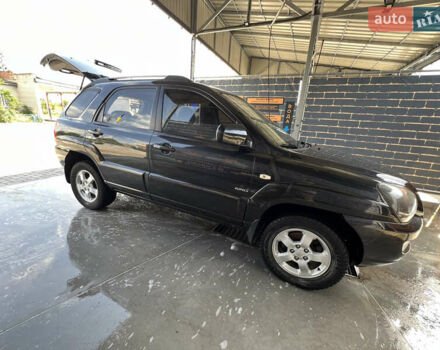 Черный Киа Sportage, объемом двигателя 2 л и пробегом 150 тыс. км за 10000 $, фото 16 на Automoto.ua