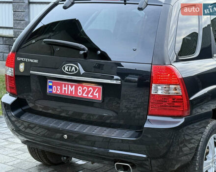 Чорний Кіа Sportage, об'ємом двигуна 2 л та пробігом 215 тис. км за 8600 $, фото 31 на Automoto.ua