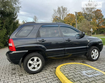 Черный Киа Sportage, объемом двигателя 1.98 л и пробегом 264 тыс. км за 6500 $, фото 31 на Automoto.ua