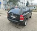 Черный Киа Sportage, объемом двигателя 2 л и пробегом 215 тыс. км за 8800 $, фото 3 на Automoto.ua