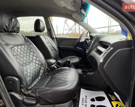 Черный Киа Sportage, объемом двигателя 1.98 л и пробегом 293 тыс. км за 6600 $, фото 20 на Automoto.ua