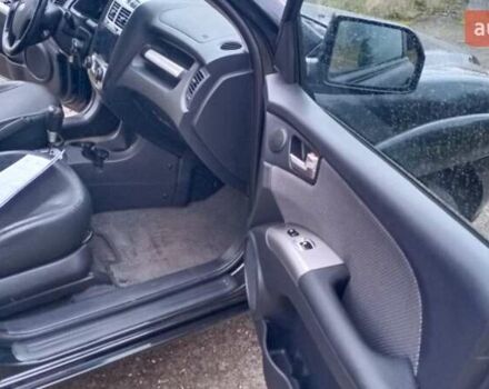 Черный Киа Sportage, объемом двигателя 2 л и пробегом 275 тыс. км за 7600 $, фото 13 на Automoto.ua