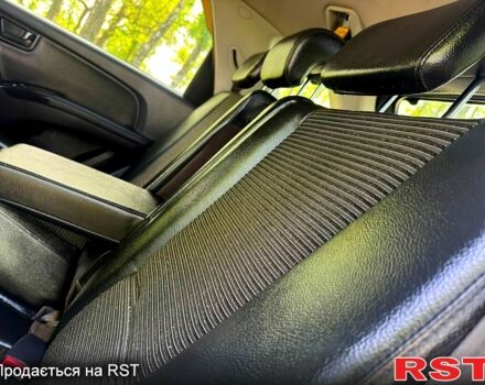 Черный Киа Sportage, объемом двигателя 2 л и пробегом 170 тыс. км за 7999 $, фото 7 на Automoto.ua