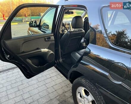 Черный Киа Sportage, объемом двигателя 2 л и пробегом 226 тыс. км за 8800 $, фото 7 на Automoto.ua