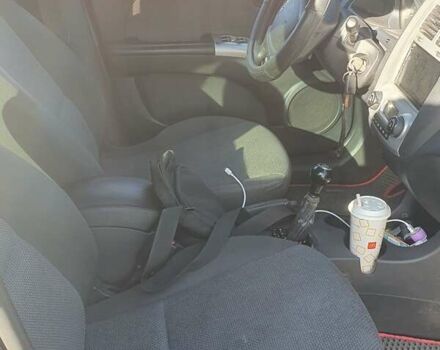 Чорний Кіа Sportage, об'ємом двигуна 2 л та пробігом 290 тис. км за 8200 $, фото 10 на Automoto.ua