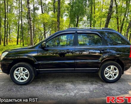 Черный Киа Sportage, объемом двигателя 2 л и пробегом 170 тыс. км за 7999 $, фото 1 на Automoto.ua