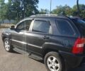 Чорний Кіа Sportage, об'ємом двигуна 2 л та пробігом 290 тис. км за 8200 $, фото 9 на Automoto.ua