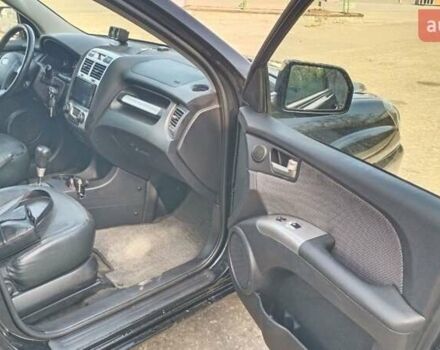 Черный Киа Sportage, объемом двигателя 2 л и пробегом 270 тыс. км за 7700 $, фото 4 на Automoto.ua