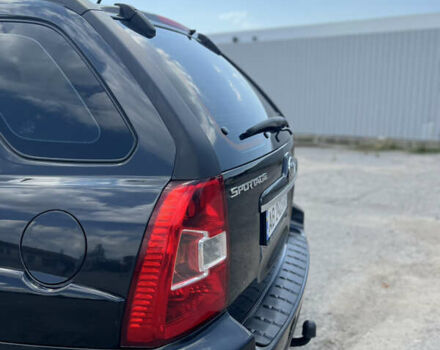 Черный Киа Sportage, объемом двигателя 2 л и пробегом 150 тыс. км за 10000 $, фото 15 на Automoto.ua