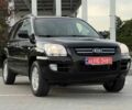 Черный Киа Sportage, объемом двигателя 2 л и пробегом 246 тыс. км за 7700 $, фото 1 на Automoto.ua