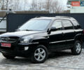 Чорний Кіа Sportage, об'ємом двигуна 2 л та пробігом 215 тис. км за 8600 $, фото 21 на Automoto.ua