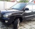 Черный Киа Sportage, объемом двигателя 2 л и пробегом 291 тыс. км за 6500 $, фото 2 на Automoto.ua