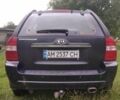Чорний Кіа Sportage, об'ємом двигуна 2 л та пробігом 248 тис. км за 8600 $, фото 1 на Automoto.ua