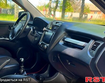 Черный Киа Sportage, объемом двигателя 2 л и пробегом 170 тыс. км за 7999 $, фото 9 на Automoto.ua