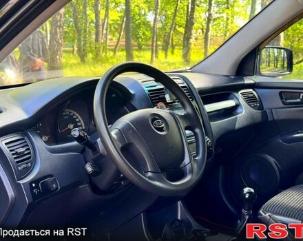Черный Киа Sportage, объемом двигателя 2 л и пробегом 170 тыс. км за 7999 $, фото 4 на Automoto.ua
