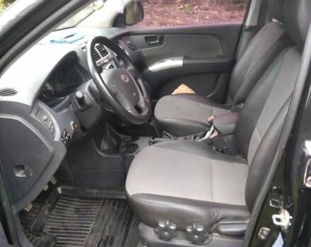 Чорний Кіа Sportage, об'ємом двигуна 2 л та пробігом 248 тис. км за 8600 $, фото 3 на Automoto.ua