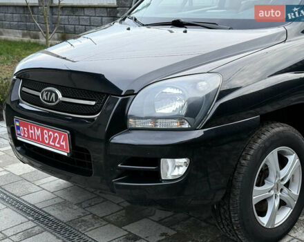 Чорний Кіа Sportage, об'ємом двигуна 2 л та пробігом 215 тис. км за 8600 $, фото 18 на Automoto.ua