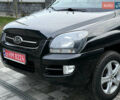 Чорний Кіа Sportage, об'ємом двигуна 2 л та пробігом 215 тис. км за 8600 $, фото 18 на Automoto.ua