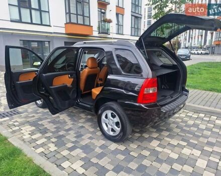Черный Киа Sportage, объемом двигателя 2 л и пробегом 207 тыс. км за 7950 $, фото 24 на Automoto.ua