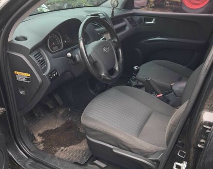 Черный Киа Sportage, объемом двигателя 2 л и пробегом 167 тыс. км за 9000 $, фото 4 на Automoto.ua