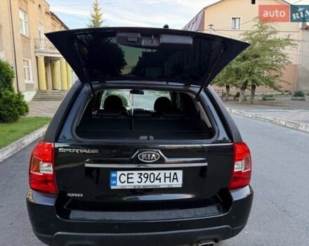 Чорний Кіа Sportage, об'ємом двигуна 2 л та пробігом 211 тис. км за 7700 $, фото 15 на Automoto.ua