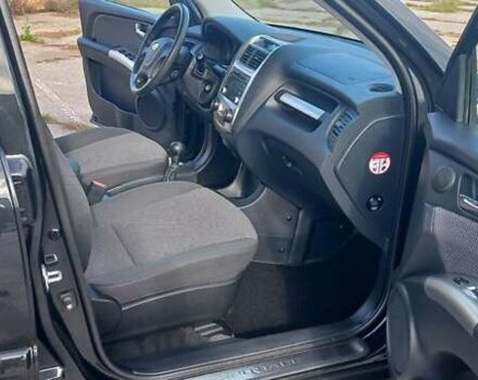 Чорний Кіа Sportage, об'ємом двигуна 2 л та пробігом 167 тис. км за 8999 $, фото 32 на Automoto.ua