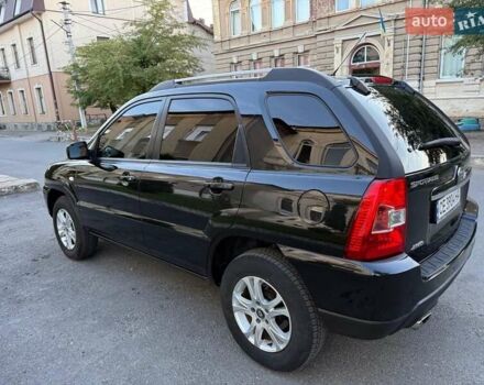 Чорний Кіа Sportage, об'ємом двигуна 2 л та пробігом 211 тис. км за 7700 $, фото 9 на Automoto.ua