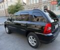 Чорний Кіа Sportage, об'ємом двигуна 2 л та пробігом 211 тис. км за 7700 $, фото 9 на Automoto.ua