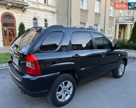 Чорний Кіа Sportage, об'ємом двигуна 2 л та пробігом 211 тис. км за 7700 $, фото 12 на Automoto.ua