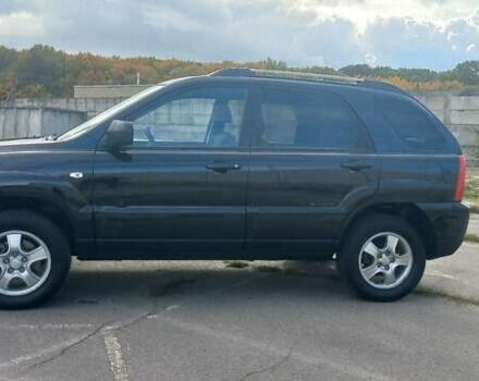 Чорний Кіа Sportage, об'ємом двигуна 2 л та пробігом 167 тис. км за 8999 $, фото 4 на Automoto.ua