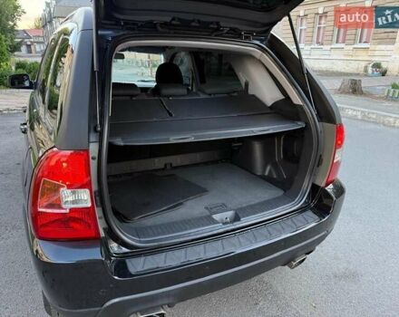 Чорний Кіа Sportage, об'ємом двигуна 2 л та пробігом 211 тис. км за 7700 $, фото 19 на Automoto.ua
